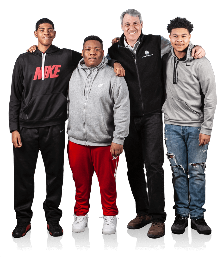 Scott and students pose together