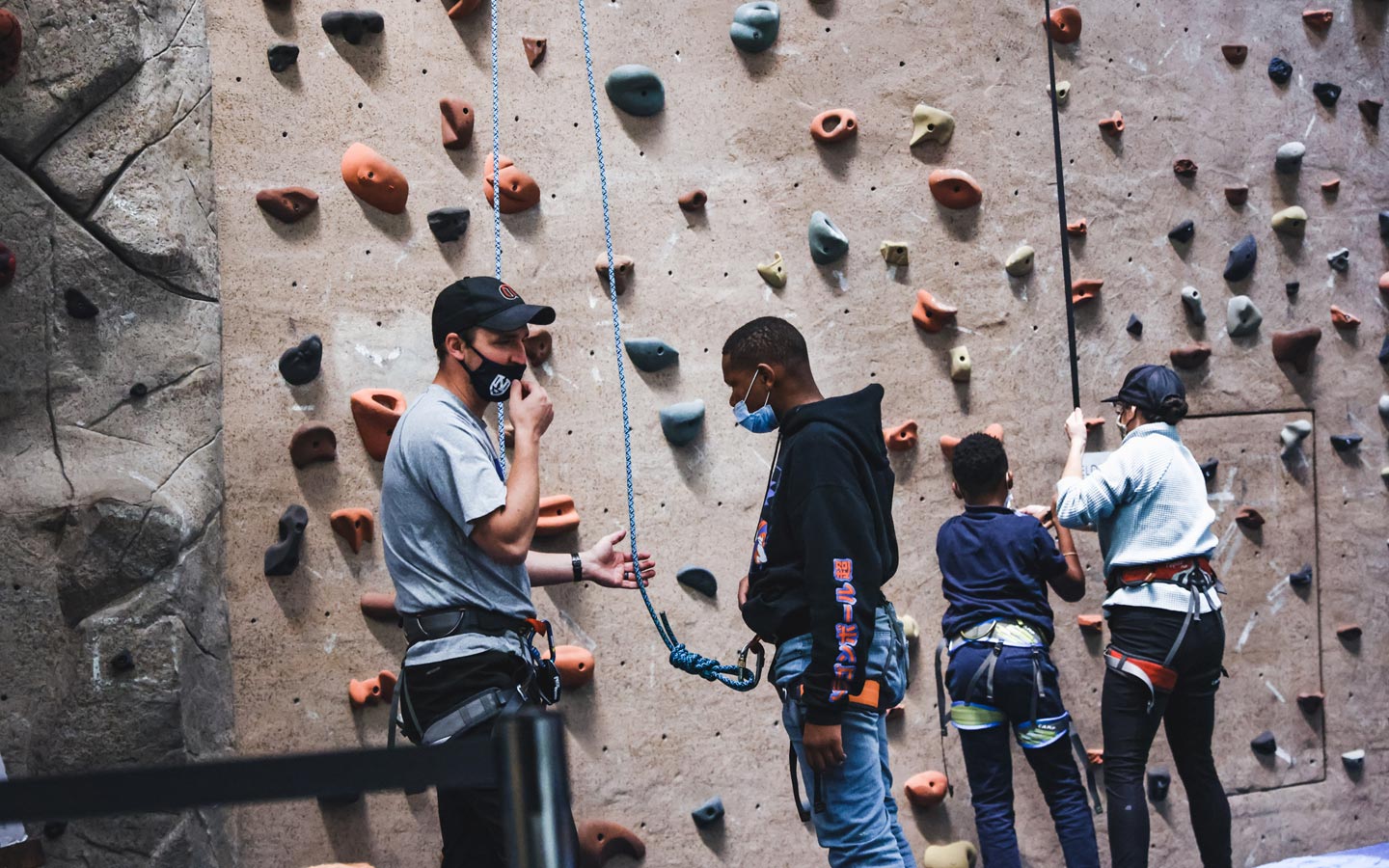 Boys climbing Rock Wall